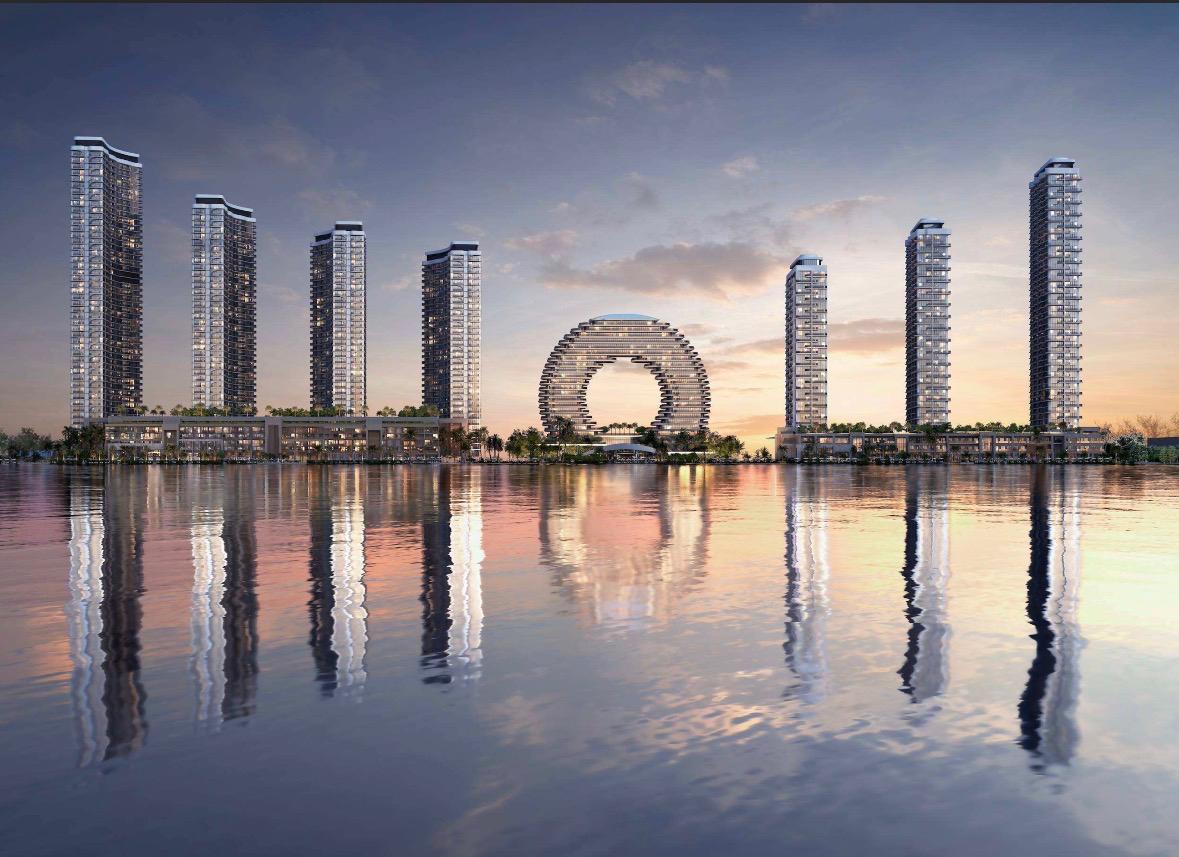 Aangeleverde projectimpressie van woontorens weerspiegeld in water